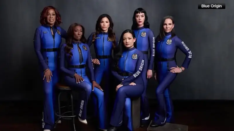 All-female Blue Origin spaceflight crew, including celebrities and accomplished STEM professionals, posing in custom flight suits before launch